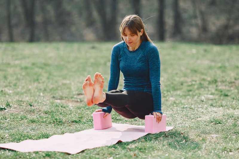 outdoor workout using yoga blocks