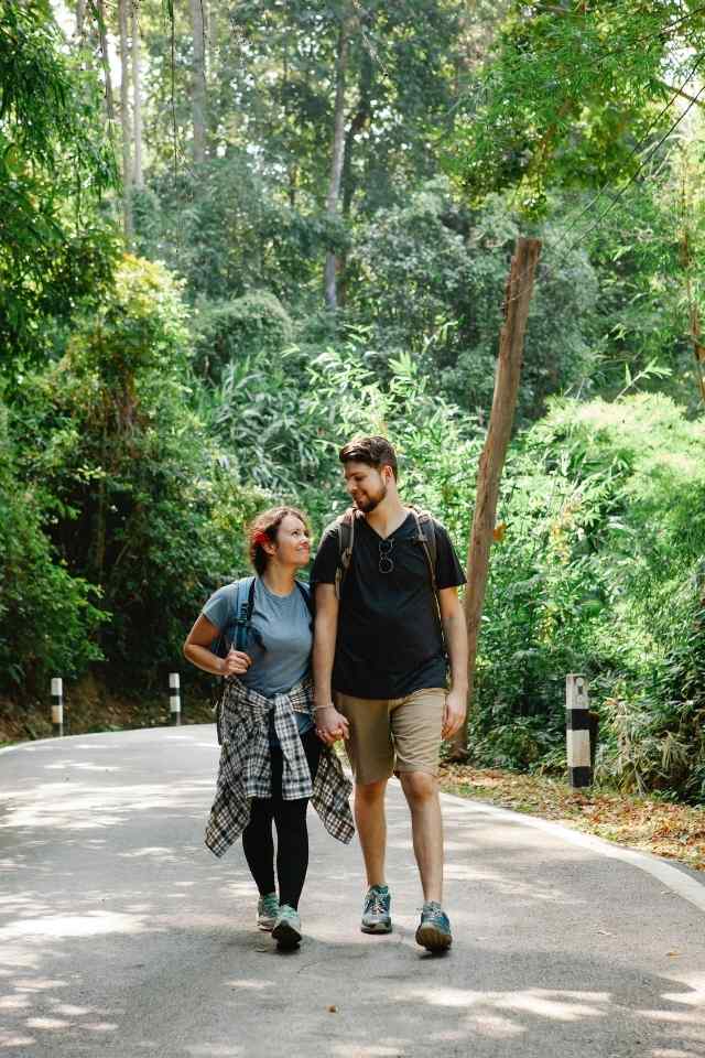 couple walking on the road