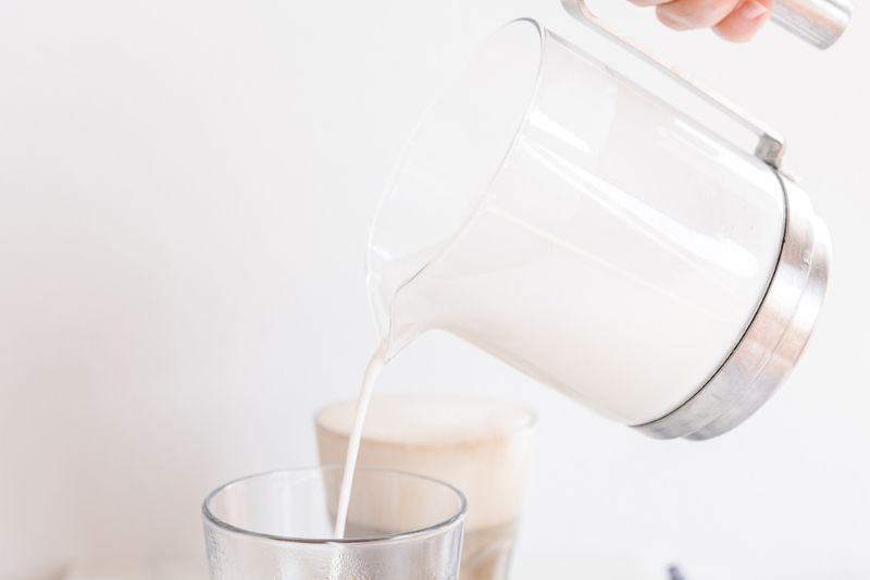 pouring milk into glass