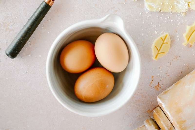 three eggs in a bowl