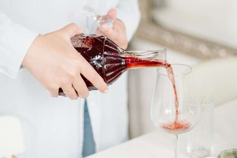 pouring red wine